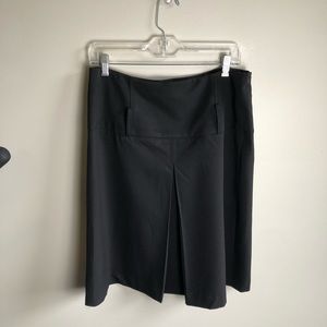 Pretty broad waist black skirt with large pleat in the front